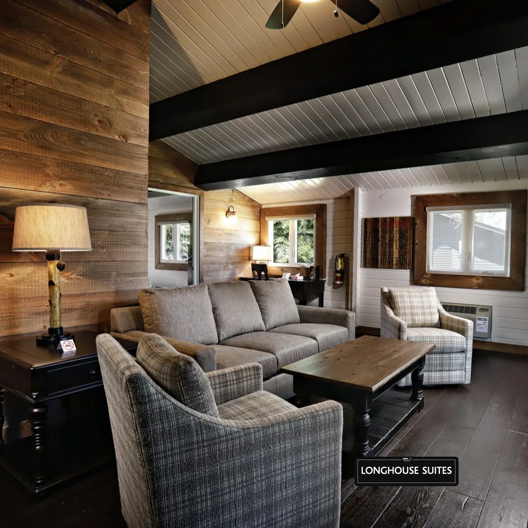 Long House Suite living room with timber beams and seating at Killarney Mountain Lodge
