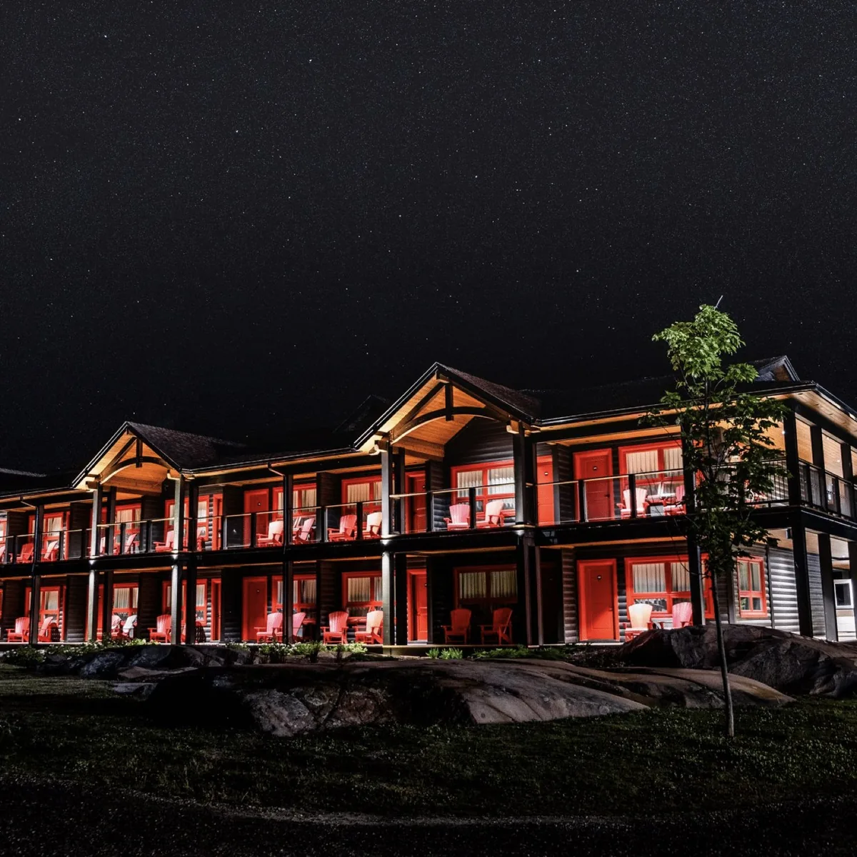 Covered Portage building illuminated at night at Killarney Mountain Lodge